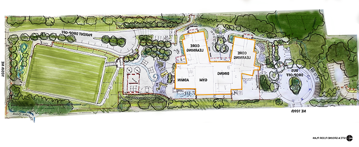 a site plan drawing with a school footprint and a field
